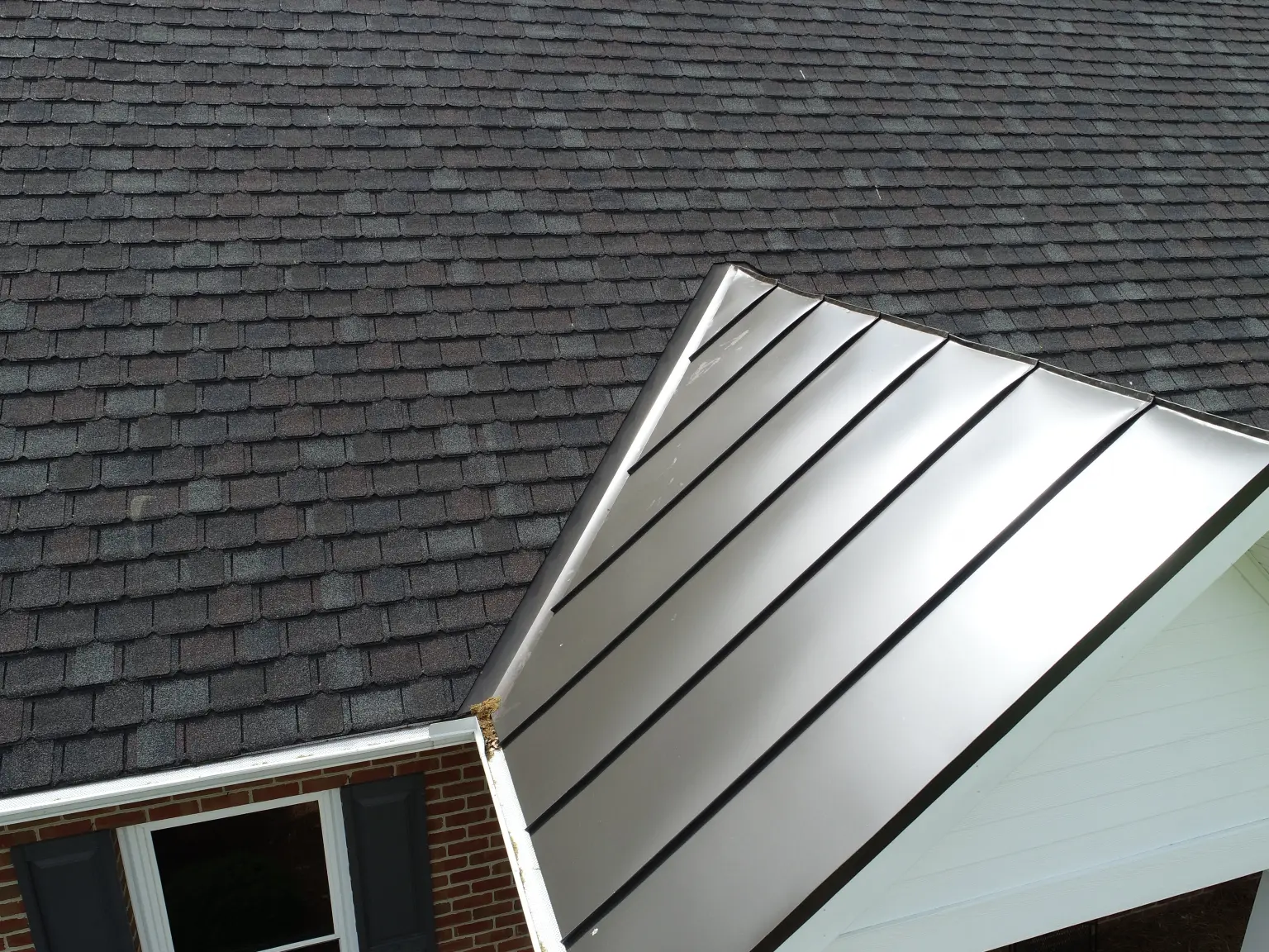 metal roofing transition to shingle roof