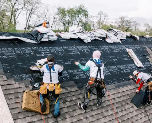 Roof Replacement team installing a new roof