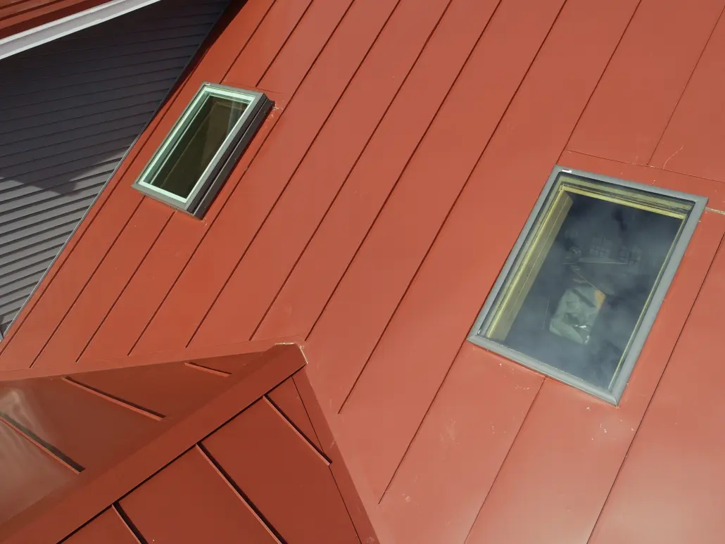 Skylights-2 Skylights on a red metal roof