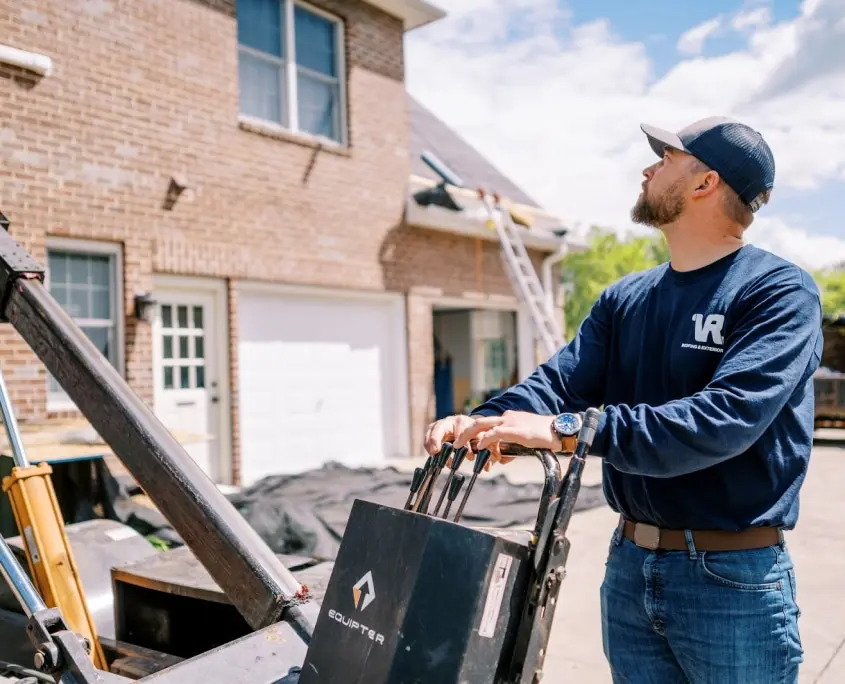 Credentials2 Roof contractor operating roofing trailer lift in Virginia