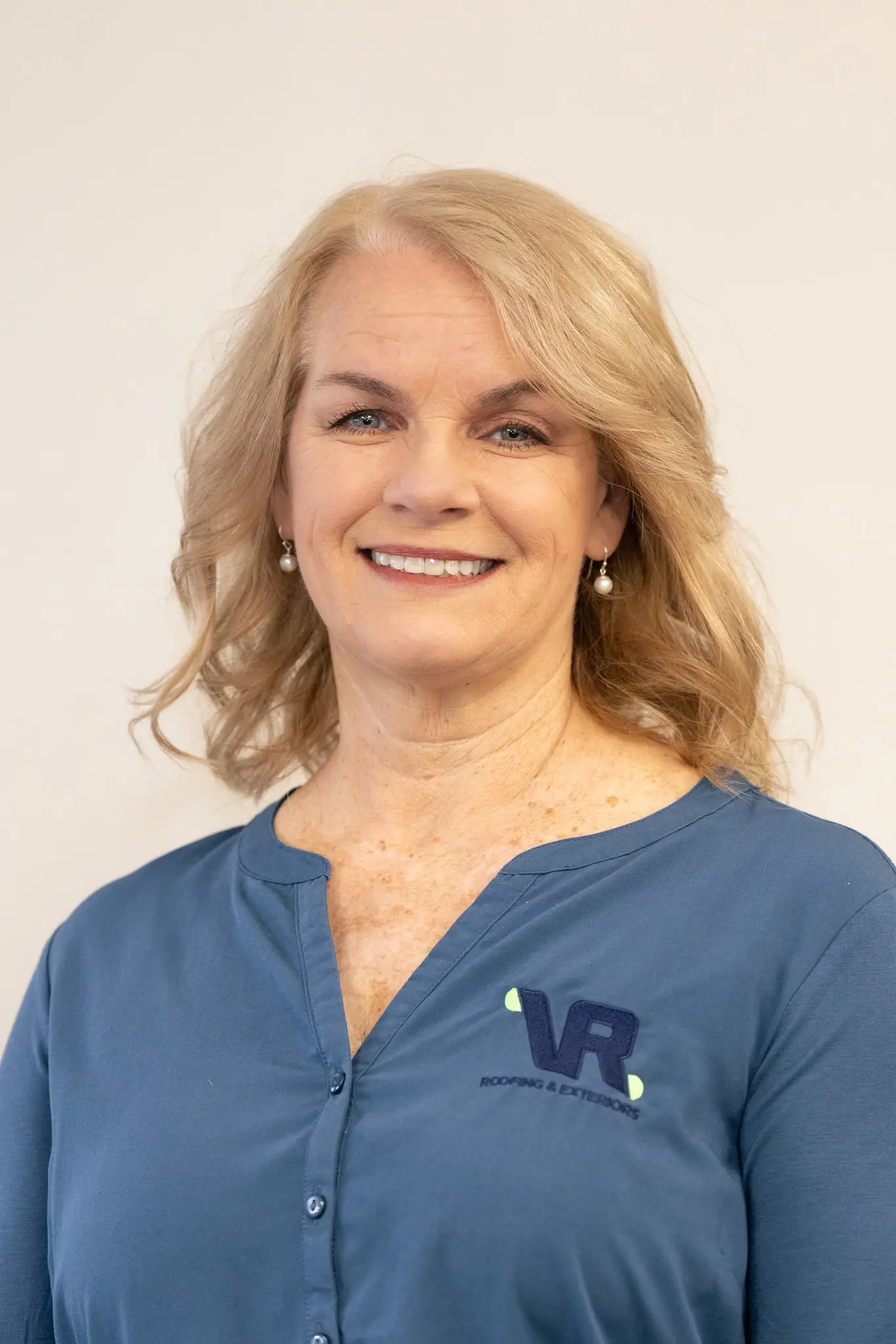 VRE-NatalieBreen-Headshot Headshot of Natalie Breen, Bookkeeper at Valley Roofing & Exteriors.
