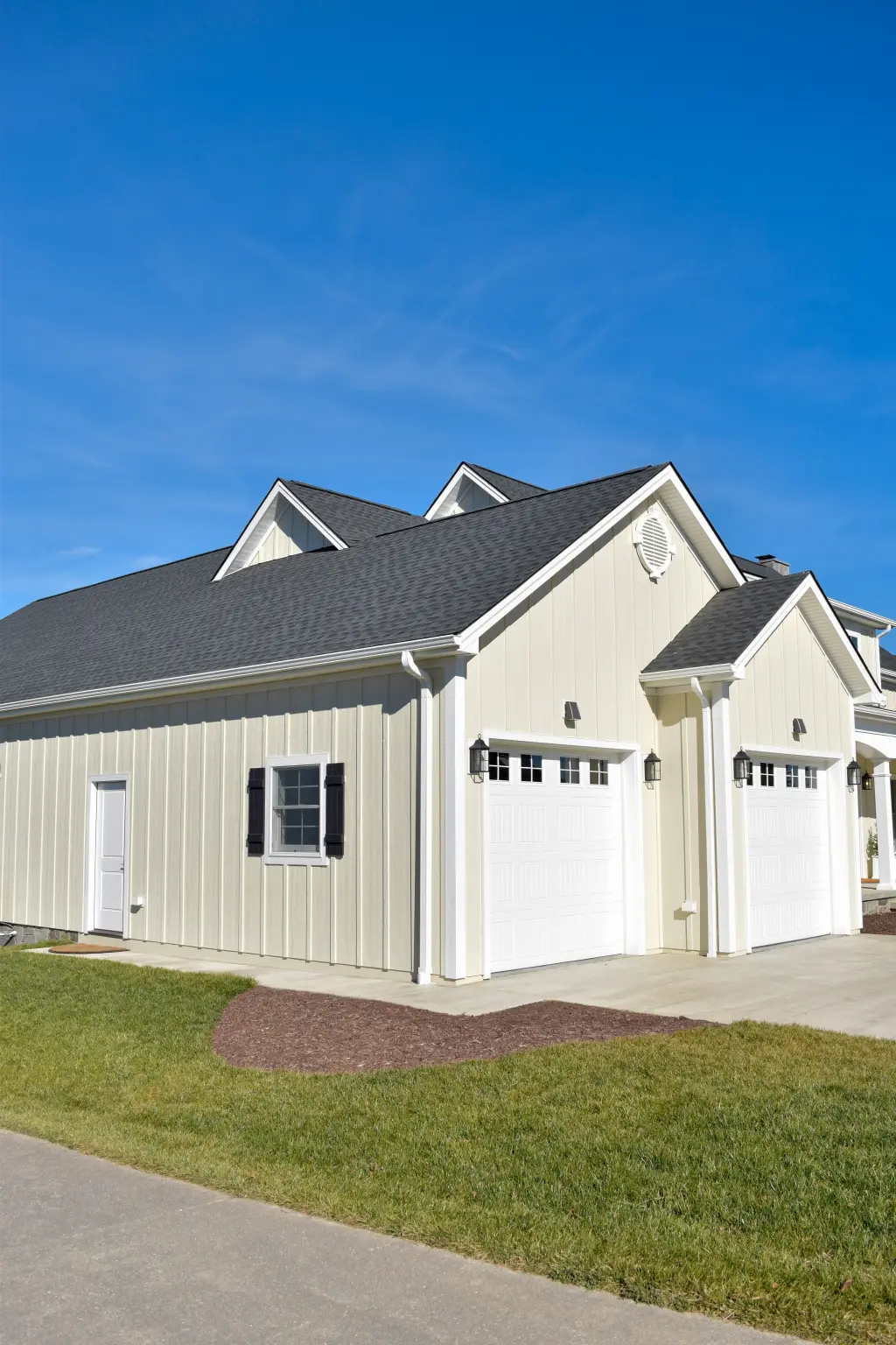 HarrisonburgHome-3 Beige home with LP SmartSide siding and gray shingle roof
