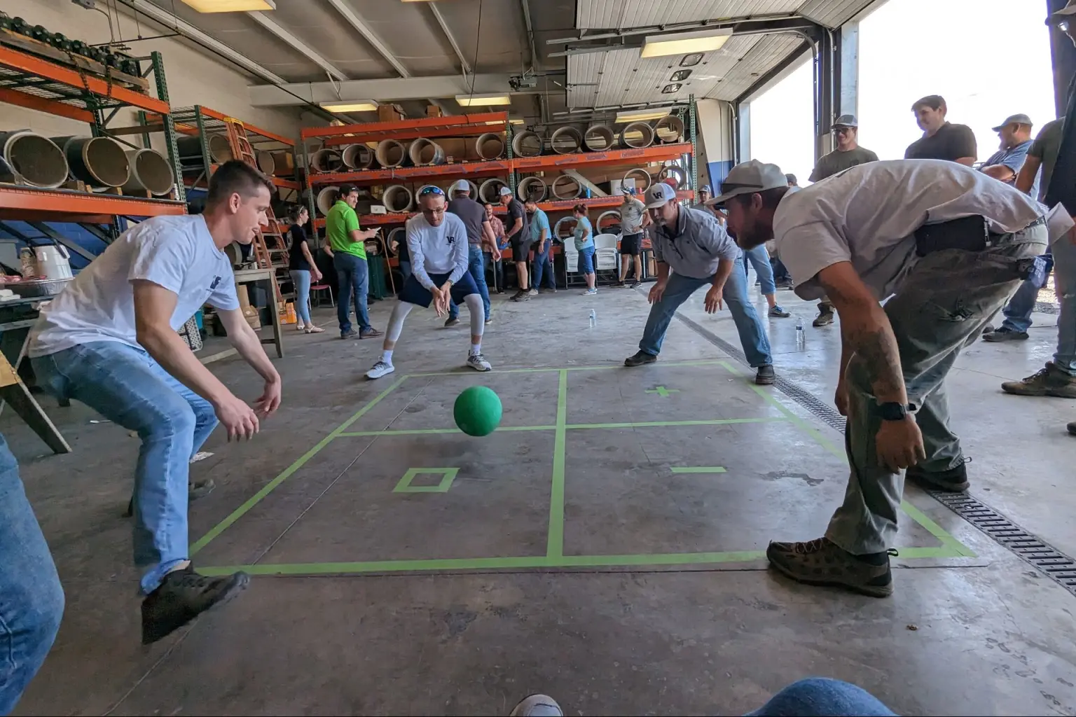 Team Meeting Valley Roofing & Exteriors playing four square at staff training day