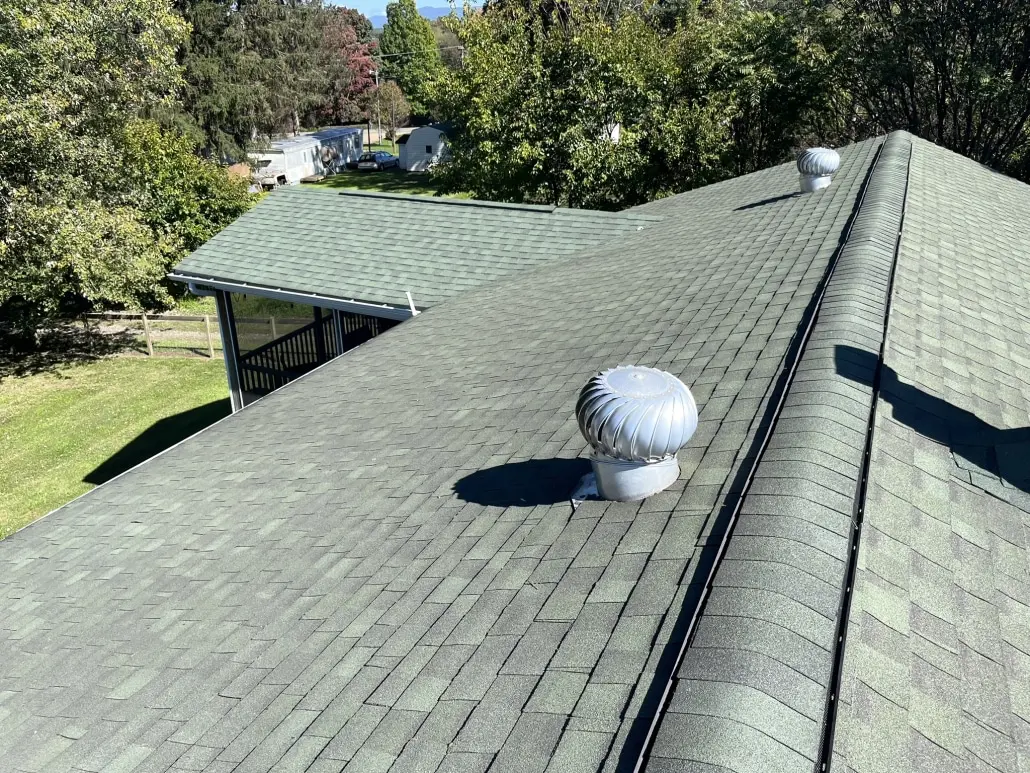 item_5c84c210-2856-4168-8fd2-b056617a741b roof shingles on top of house