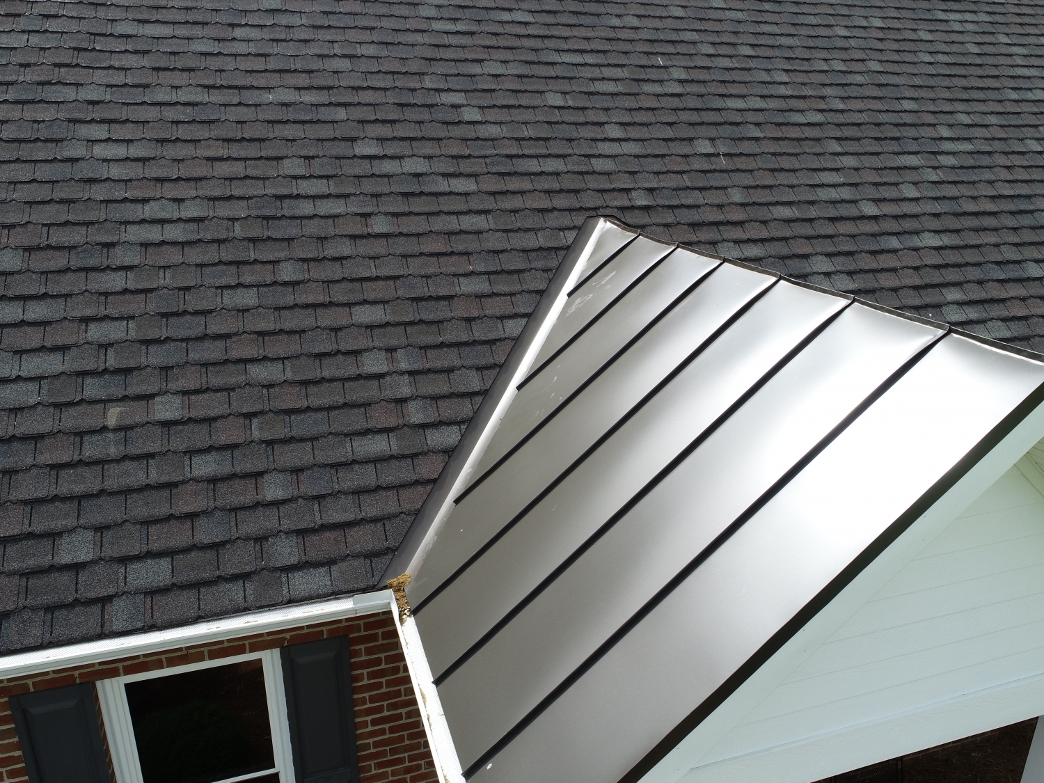 Metal Roof And Shingle Roof Valley Roofing And Exteriors