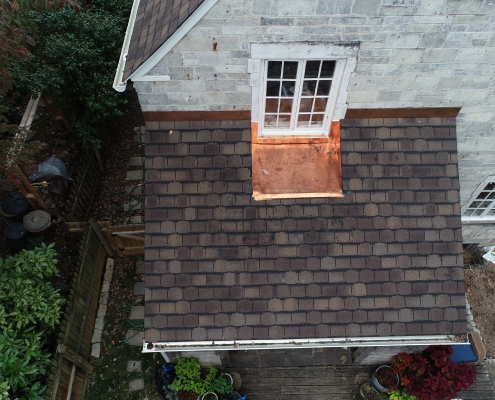 Copper Accents On Shingle Roof