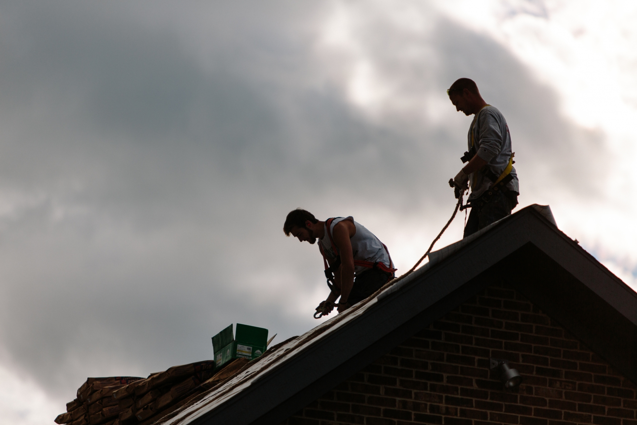 workers installing roof