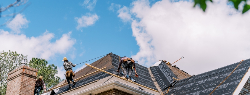 Valley Roofing & Exteriors roofers working