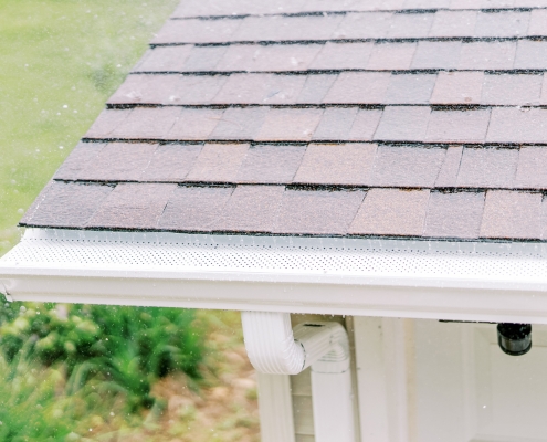 closeup of gutters with rain