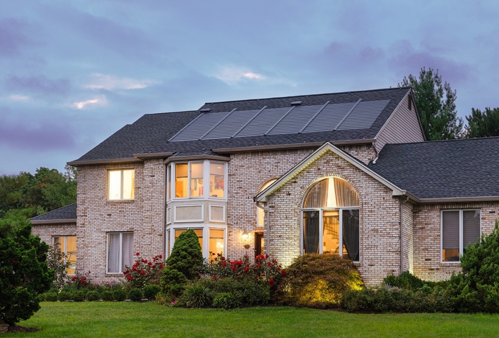 front exterior of home with timberline solar shingles on roof.