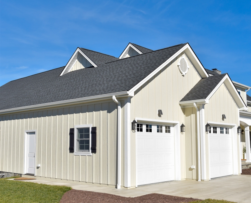 Beige home with LP SmartSide siding and gray shingle roof