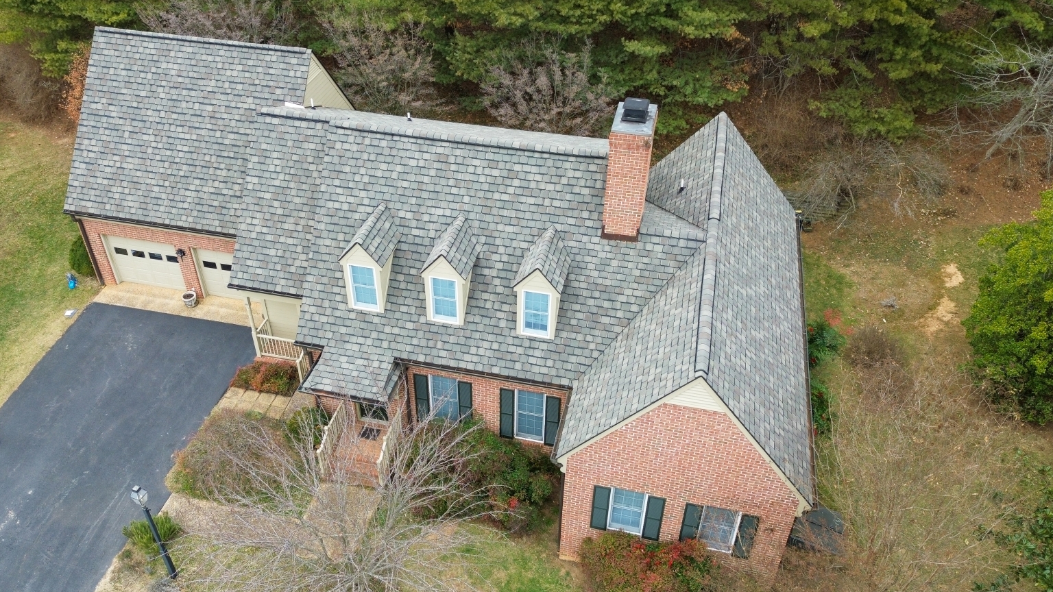 Aerial photo of a Massanutten home with designer roof shingles.